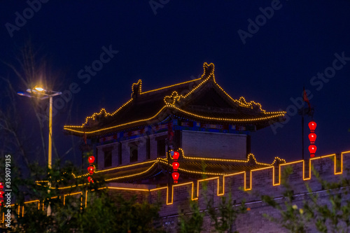 Evening view of illuminated city walls in Xi'an, China
