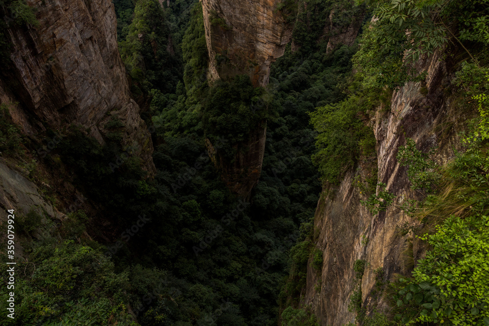 View down the sandstone pillars in Wulingyuan Scenic and Historic Interest Area in Zhangjiajie National Forest Park in Hunan province, China View down the sandstone pillars in Wulingyuan Scenic and Historic Interest Area in Zhangjiajie National Forest Park in Hunan province, China