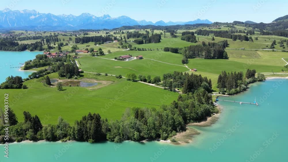 Aerial view over Lake Forggensee at the city of Fuessen in Bavaria Germany Aerial view over Lake Forggensee at the city of Fuessen in Bavaria Germany