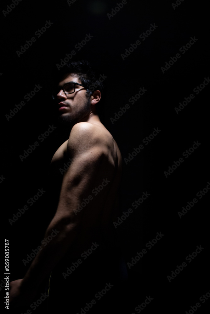 MUSCULAR MAN WITH MARKED TORSO