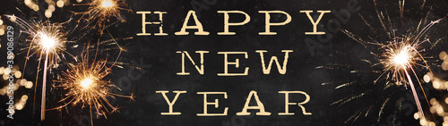 Happy new year Silvester background banner panorama long- firework on rustic dark black grey stone concrete texture, with space for text