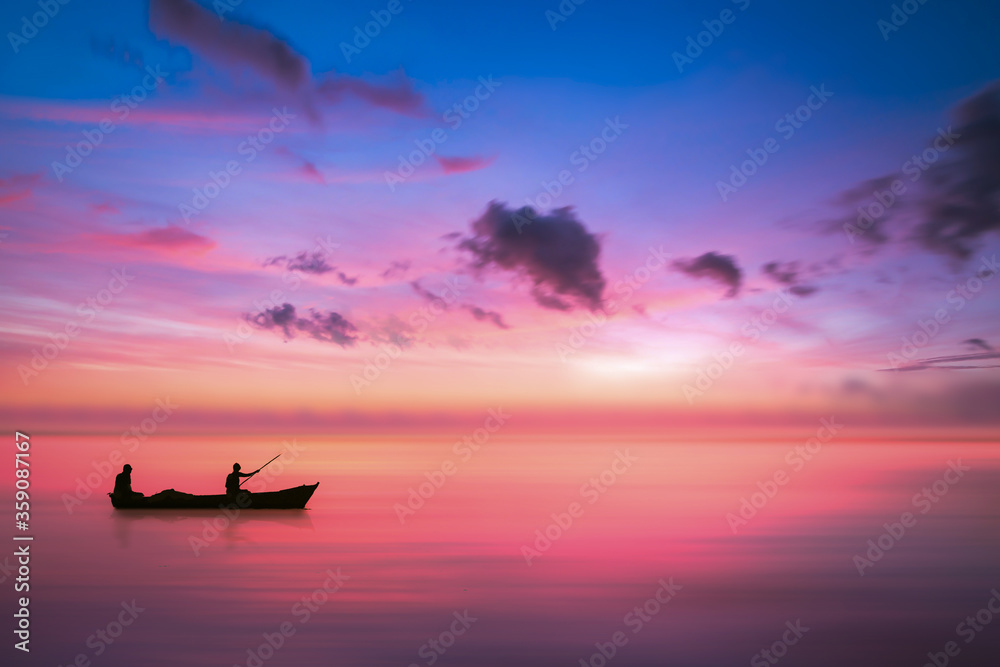 small boat and Fisherman Before sunrise in the sea with negative space 