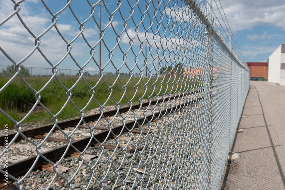 Chain Link Mesh Fence in front of Railway Track Chain Link Mesh Fence in front of Railway Track