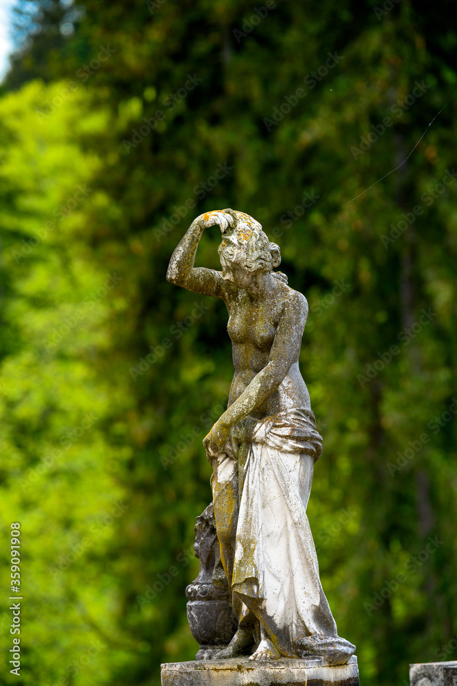 Statue at the Peles Castle, a Neo-Renaissance castle in the Carpathian Mountains, Sinaia, Prahova County, Romania Statue at the Peles Castle, a Neo-Renaissance castle in the Carpathian Mountains, Sinaia, Prahova County, Romania