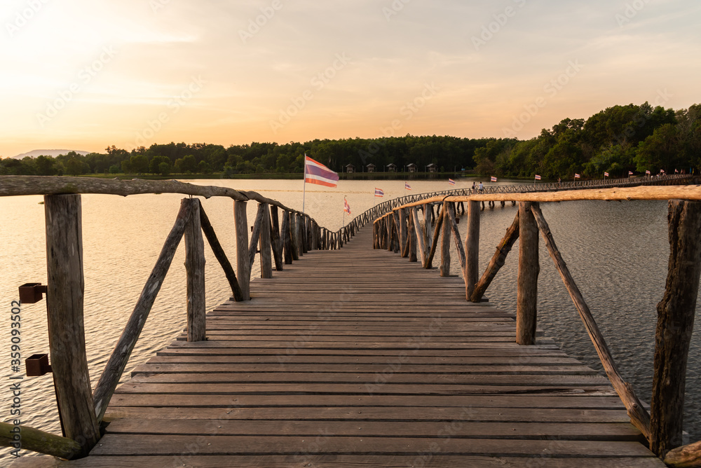 wooden bridge over a lake