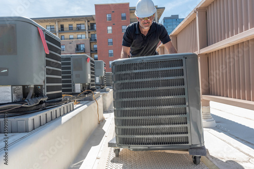 Wall Mural Moving a new air conditioner for an install