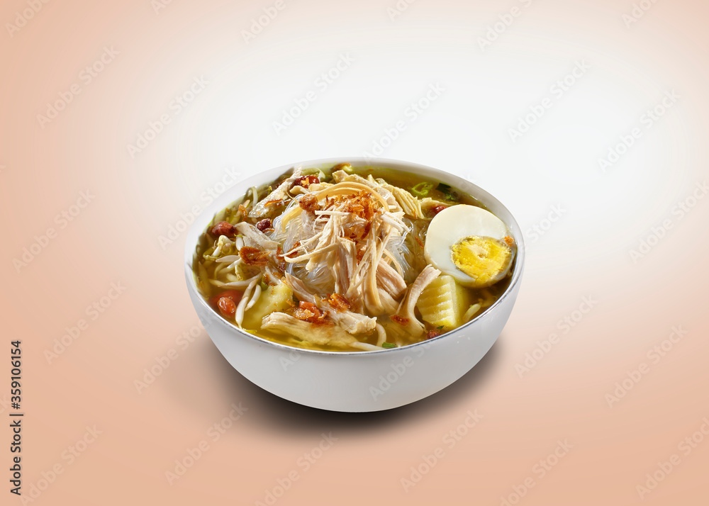 Soto Ayam or Chicken Soto. Yellow chicken soup containing cabbage, vermicelli, potato slices, celery, leeks, tomato, fried onions. Soto Ayam or Chicken Soto. Yellow chicken soup containing cabbage, vermicelli, potato slices, celery, leeks, tomato, fried onions.