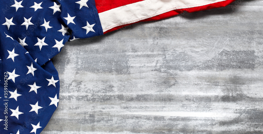 Obraz premium US American flag on worn white wooden background. For USA Memorial day, Veteran's day, Labor day, or 4th of July celebration. With blank space for text.