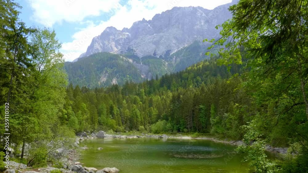 Lake Frillensee in Bavaria is a small and beautiful mountain lake in the German Alps - travel photography