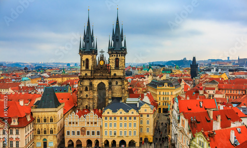 Panroamic view over traditional red roofs in old town onto Famous Church of our lady before Tyn in Prague, Czech Republic