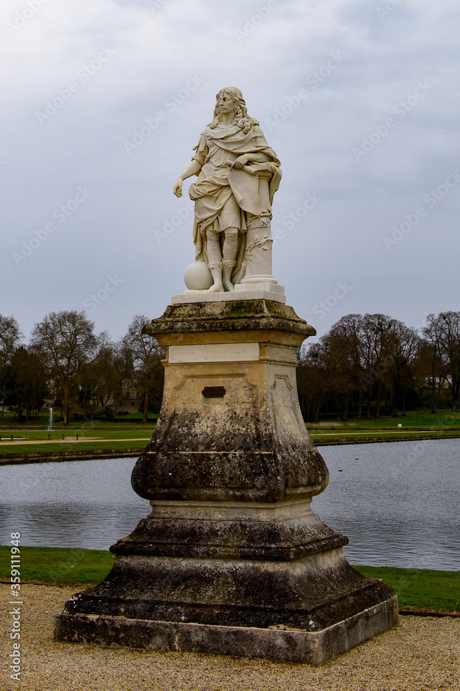 Statue in the gardens of th eCastle of Chantilly, one of the famous chateau in France