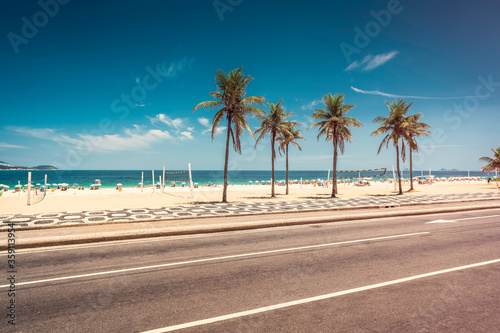 Palm Trees on Ipanema Beach with blue sky, Rio de Janeiro