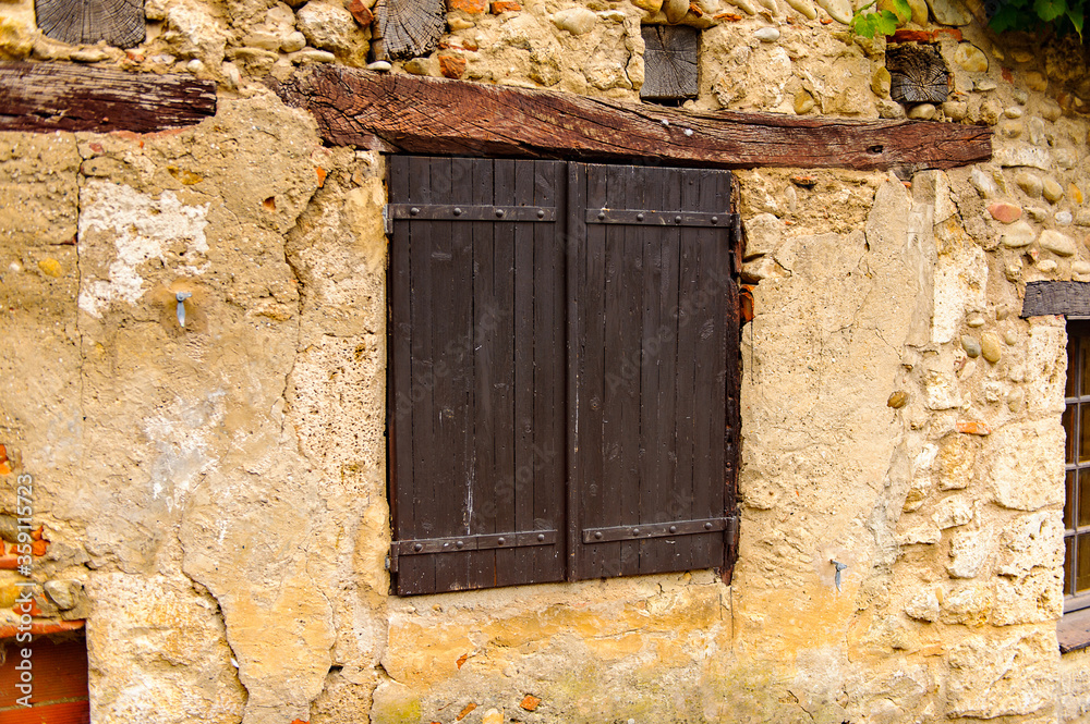 Medieval architecture of Perouges, France, a walled town, a popular touristic attraction. Medieval architecture of Perouges, France, a walled town, a popular touristic attraction.