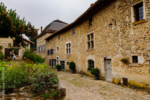Street of Perouges, France, a medieval walled town, a popular touristic attraction.