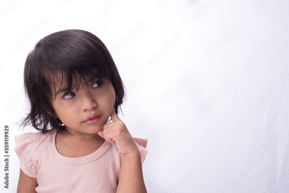 An asian child, with black hair wearing pink dress,showing various expression An asian child, with black hair wearing pink dress,showing various expression