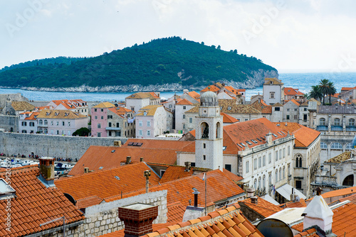 It's View from the wall on the roof tops of the Old Town of Dubrovnik on a cloudy day, Croatia photo