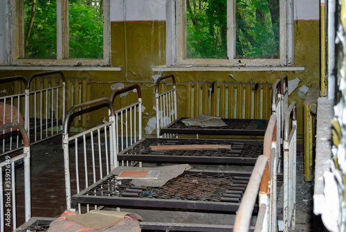 Фотография Damages beds in the Abandoned kindergarten Pripyat, a ghost town in northern Ukr