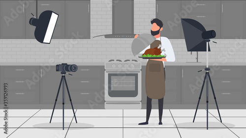 A male cook in the kitchen has a culinary blog. The guy in the kitchen apron is holding fried chicken. Vector.