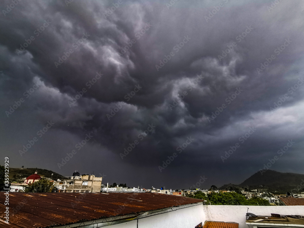 storm clouds over city