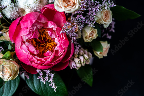 Fototapeta Naklejka Na Ścianę i Meble -  Fresh bouquet of peonies. Moody flower. Bright flower background. 