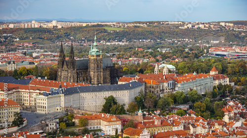 Aerial view of the Old Town architecture with red roofs in Prague , Czech Republic. St. Vitus Cathedral in Prague.