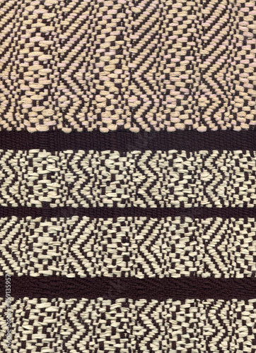 Handwoven fabric in beige and brown with zigzag pattern