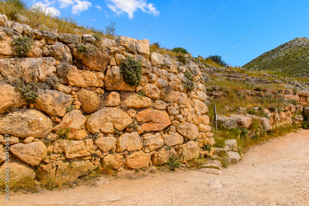 It's Lion gate of Mycenae, center of Greek civilization, Peloponnese, Greece. Mycenae is a famous archaeological site in Greece. UNESCO World Heritage Site