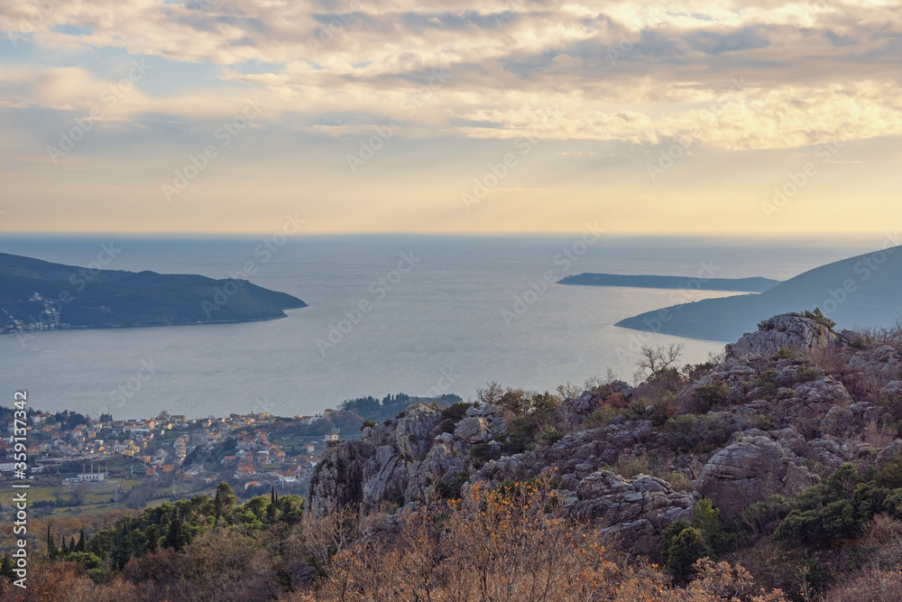 Twilight. Calm winter evening in Mediterranean.  Montenegro, view of  Adriatic Sea and coastline of Kotor Bay from mountainside of Dinaric Alps