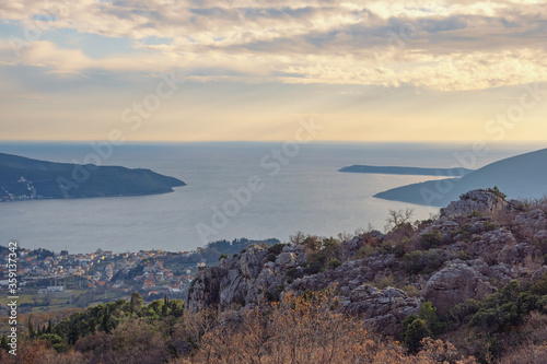 Twilight. Calm winter evening in Mediterranean. Montenegro, view of Adriatic Sea and coastline of Kotor Bay from mountainside of Dinaric Alps