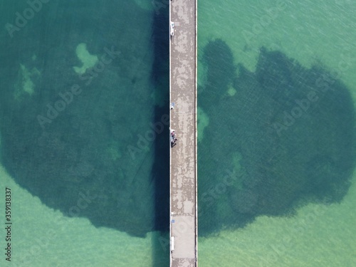 aerial view of pier and dock in the water
