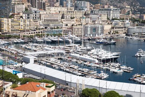 View of the Principality of Monaco and port with sailing and fishing boats