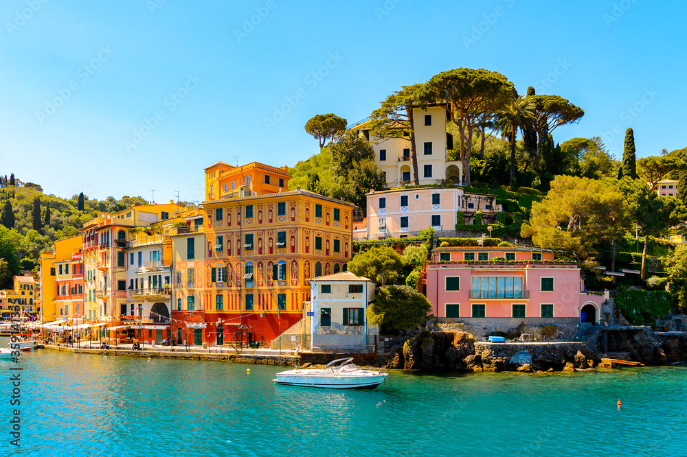 Obraz premium It's Portofino, is an Italian fishing village, Genoa province, Italy. A vacation resort with a picturesque harbour and with celebrity and artistic visitors.