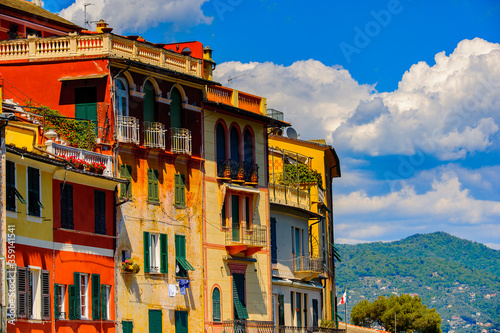 It's Close view of the colorful houses in Portofino, an Italian fishing village, Genoa province, Italy. A vacation resort with a picturesque harbour and with celebrity and artistic visitors.