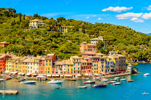 It's Panoramiv view of Portofino, is an Italian fishing village, Genoa province, Italy. A vacation resort with a picturesque harbour and with celebrity and artistic visitors. © Anton Ivanov Photo