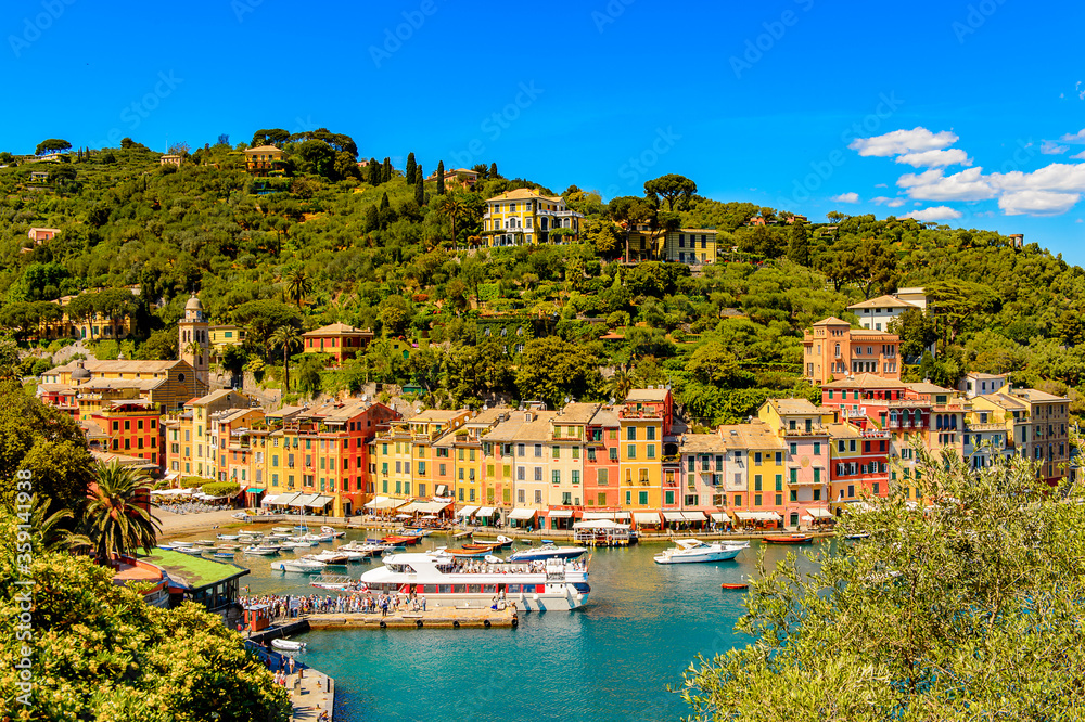 It's Panoramic view of Portofino, is an Italian fishing village, Genoa province, Italy. A vacation resort with a picturesque harbour and with celebrity and artistic visitors.
