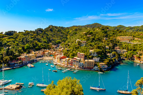 It's Aerial view of Portofino, is an Italian fishing village, Genoa province, Italy. A vacation resort with a picturesque harbour and with celebrity and artistic visitors.