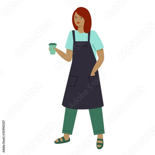 A young woman in an apron holds in her hand a cup of coffee. Barista girl.