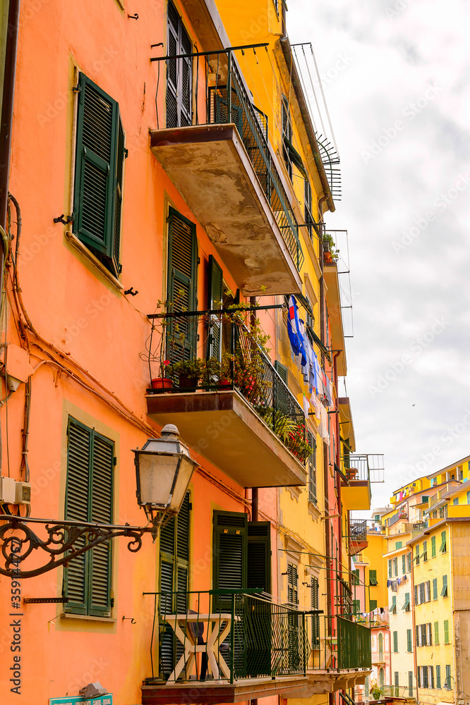 It's Houses in Riomaggiore (Rimazuu), a village in province of La Spezia, Liguria, Italy. It's one of the lands of Cinque Terre, UNESCO World Heritage Site