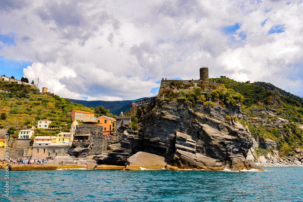 It's Stine tower of Vernazza (Vulnetia), a small town in province of La Spezia, Liguria, Italy. It's one of the lands of Cinque Terre, UNESCO World Heritage Sit