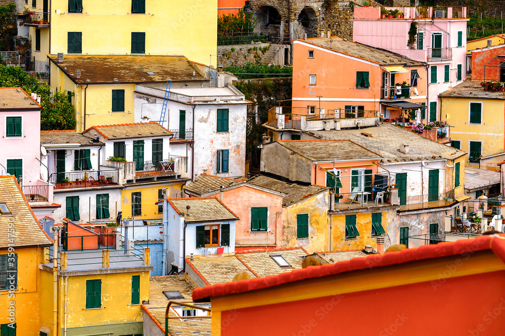 It's Vernazza (Vulnetia), a small town in province of La Spezia, Liguria, Italy. It's one of the lands of Cinque Terre, UNESCO World Heritage Site