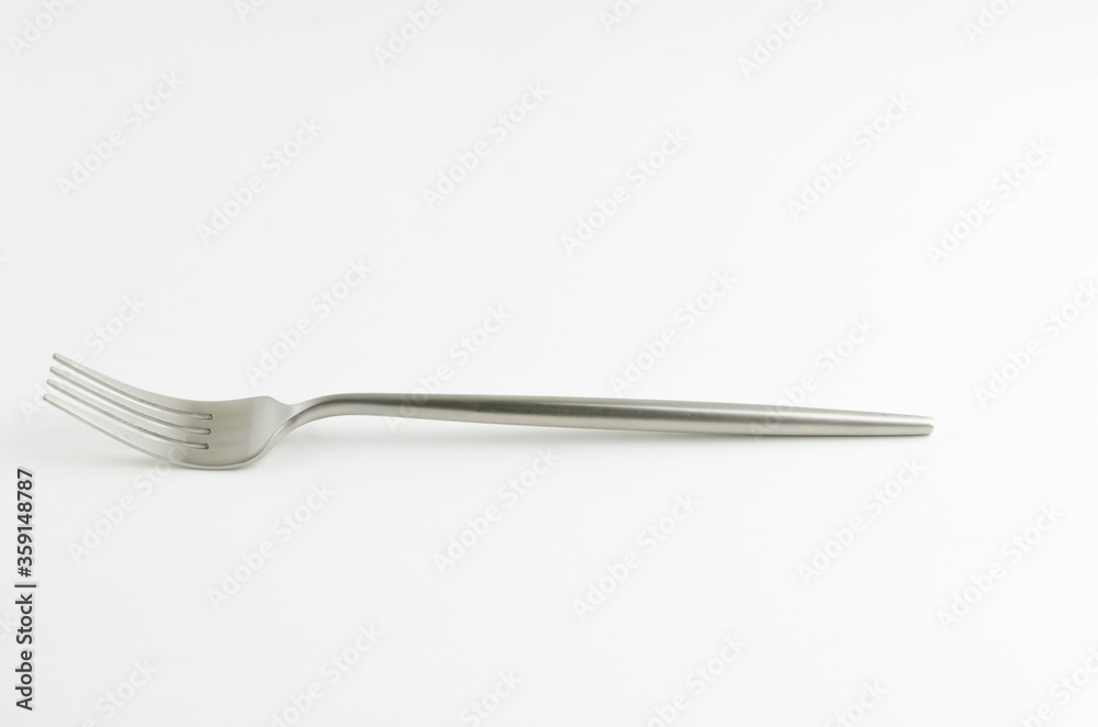 Silver fork on white background Silver fork on white background