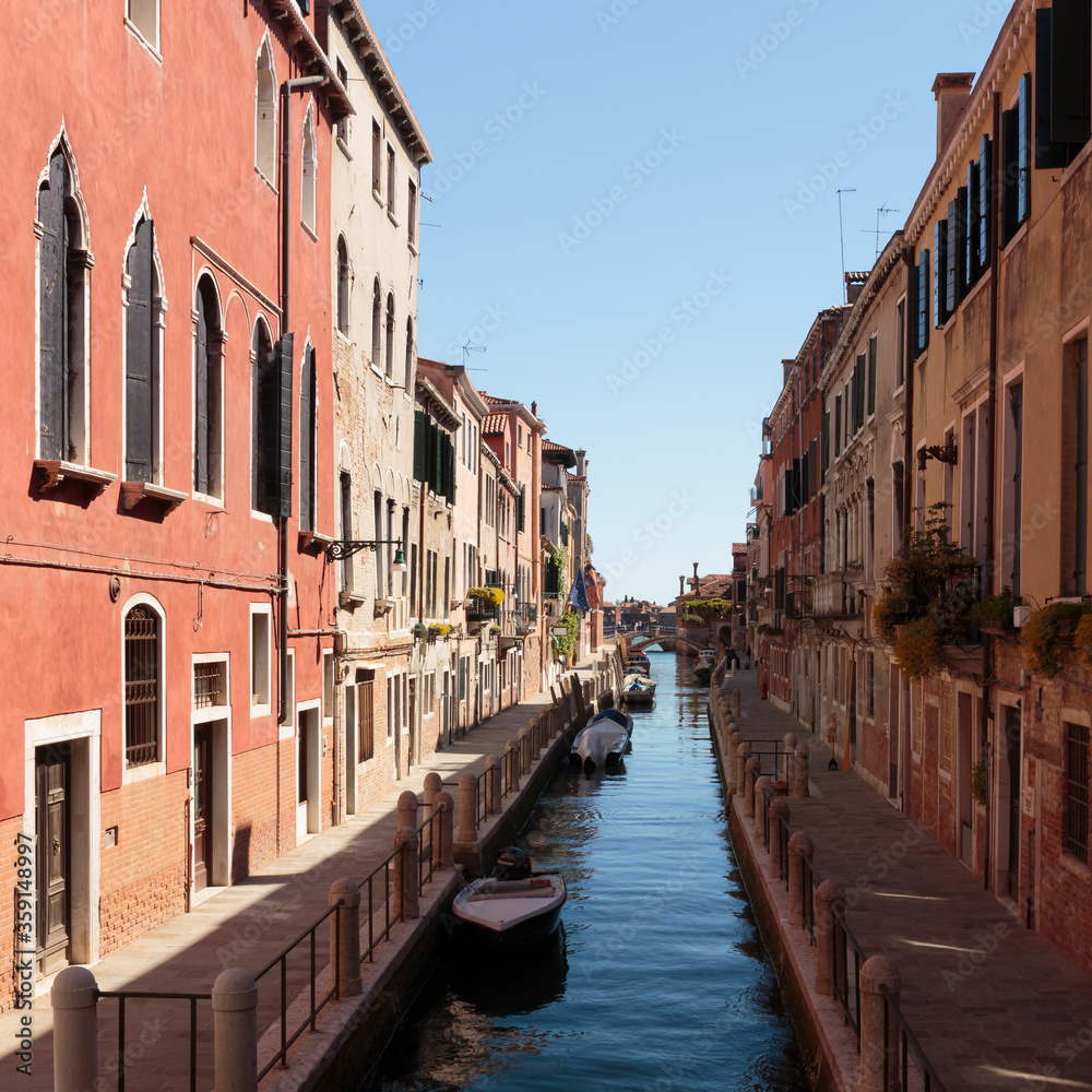 Moored boats line the Rio de la Fornace Canal, Venice, Italy