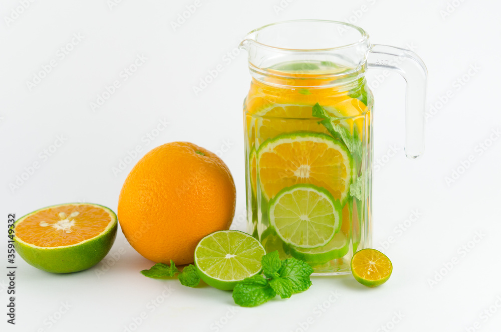 Bottle of detox water made from citrus fruits. Concept for dieting Bottle of detox water made from citrus fruits. Concept for dieting