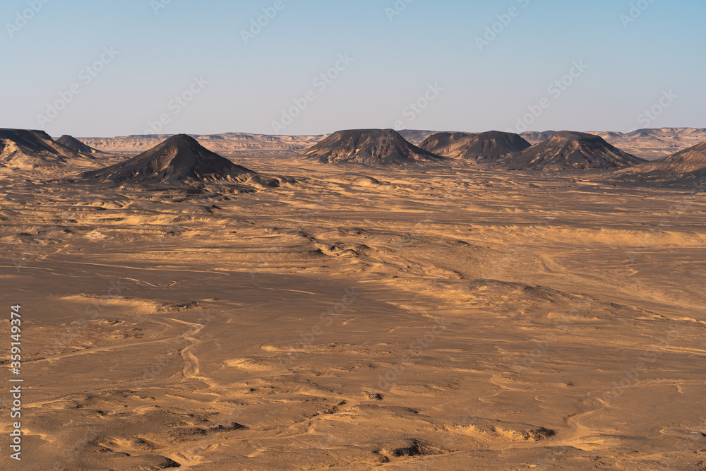 Fototapeta premium Landscape of mountains and desert in Black desert, Egypt