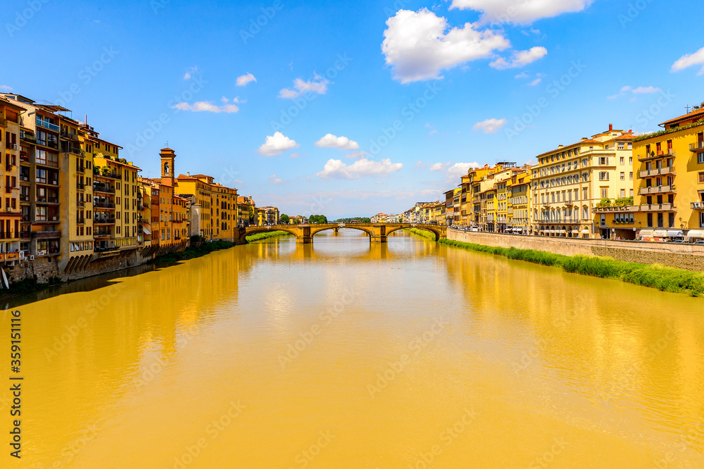 It's River Arno and architecture in Florence, Italy.