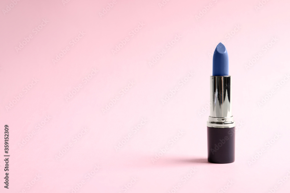 Bright lipstick on pink background. Space for text Bright lipstick on pink background. Space for text