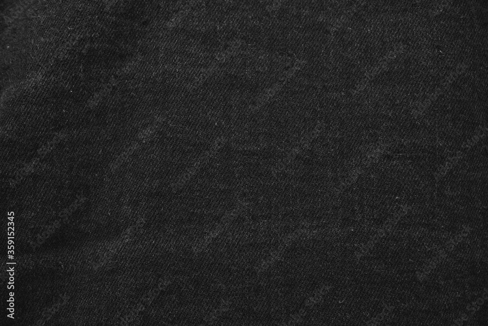 Fototapeta premium Close up of black jeans jacket fabric.