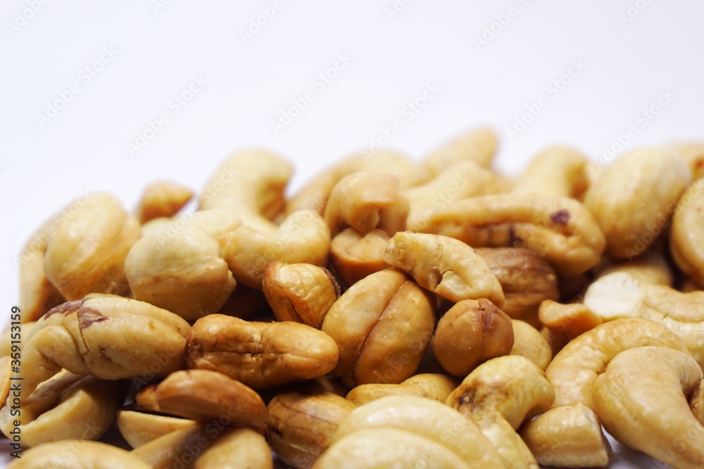 Close up of cashew nuts with white backgorund. Close up of cashew nuts with white backgorund.