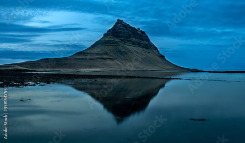 Kirkjufell and reflection at after sunset.