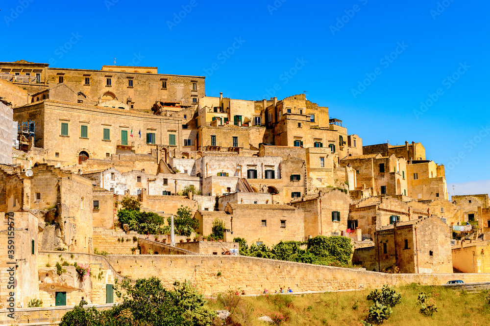 It's Panorama of Matera, Puglia, Italy. The Sassi and the Park of the Rupestrian Churches of Matera. UNESCO World Heritage site